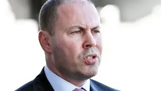 Slashed budget surplus &lsquo;significant watering down&rsquo; of govt fiscal strategy