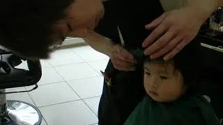 20060418 小舅舅幫祐剪頭髮
