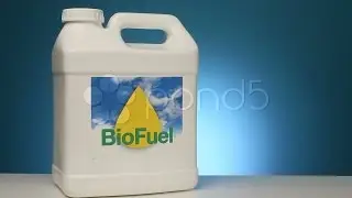 Container Of Biofuel With Beaker Of Corn. Stock Footage