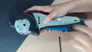 Inserting a blade into the Dremel Saw Max