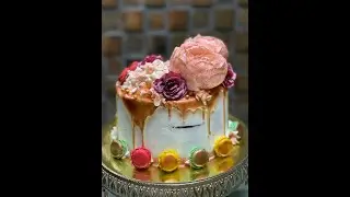 Semi Naked Rose Gold Drip Cake with Floral Arrangement