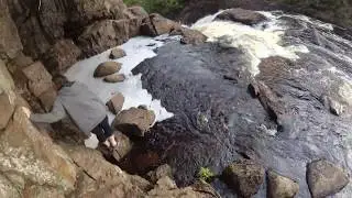Climbing some rocks at Devils Kettle Falls