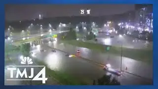 Cars stranded near Stadium Interchange during historic flooding