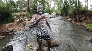 See how African boy bath in the river when he is in the villa 