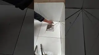 This worker is a professional at cutting and installing ceramic tile lights in various angles.