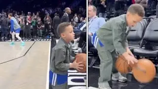 Stephen Curry's Son Canon practicing his Basketball skills while Steph warms up in the Background