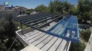 A time-lapse video showing the installation of an EZ Glaze car park canopy