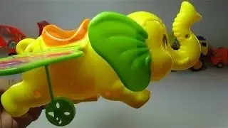 giallo fly elefante |   capretto gioca |   giocattoli animali |   video per bambini