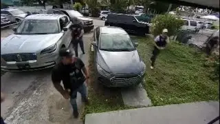 Surveillance cameras catch an ICE raid in South Florida | Quickcast