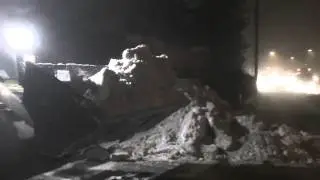 Wille 855 loading a Volvo FM 440 Truck With Snow