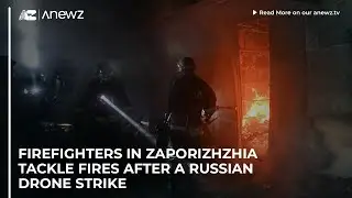 Firefighters in Zaporizhzhia tackle fires after a Russian drone strike
