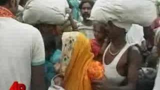 Indian Flood Refugees Settle at Camps