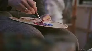 A Person Mixing Paints on a Palette | Royalty Free 4K Stock Video Footage