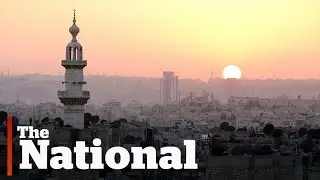 Guns quiet in Syrian town under Assad's 'reconciliation' campaign