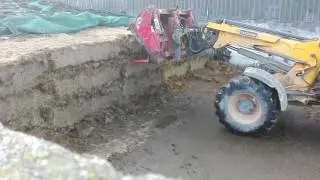 Grabbing silage with jcb 310s and redrock grab.