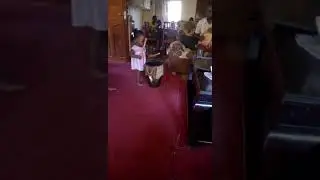 A one year baby makes sound from adrum
