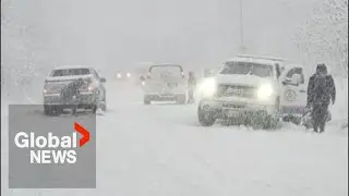 Heavy snow sweeps across Toronto area, causing traffic chaos