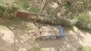 ISUZU Lorry dumping construction waste on road