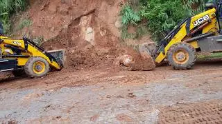 Jcb Removing big stone that blocked the Road