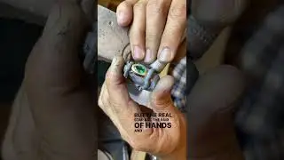 Hand making a custom pear cut dark green emerald masculine bezel signet men's ring 1.90 carats