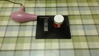 How to apply shrink band on jar?