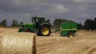 Baling the Straw Harvest with John Deere Tractor and Baler.