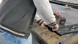 Metal Gate repair. Installing heavy duty hinges.