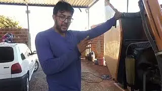 adaptação de calço na tomada da bomba hidráulica da retroescavadeira 580m e a chave geral