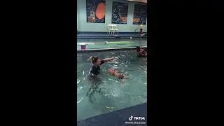 Mum who got death threats for throwing baby in pool urges people to do research