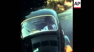 SYND 15-8-73 EXPELLED ISRAELI DIPLOMAT YIGAL EYAL DRIVING OFF IN A CAR