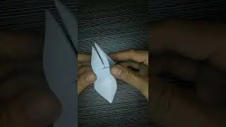 folding paper into a bird #drawingfun #drawing #shorts #foldingpaper #easyart #geometryart