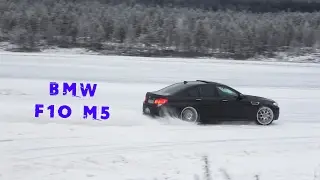 BMW F10 M5 having fun on a frozen lake