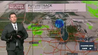 Two sweet puppies join to give Thursday's forecast