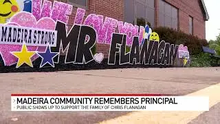Procession for Principal Chris Flanagan stops at Madeira schools