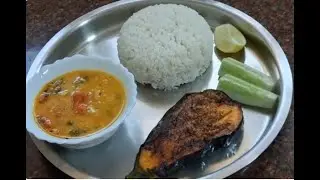 @jubja1944 Bengali vegetarian lunch of fried eggplants with masur dal, cucumber & slice of lemon 