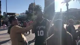 Dennis Rodman smokes cigar in middle of Vegas Strip while waiting on Uber & wearing old Spurs jersey