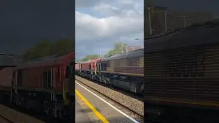 Ex EWS 66083 drags DB 66001 on empty steel train