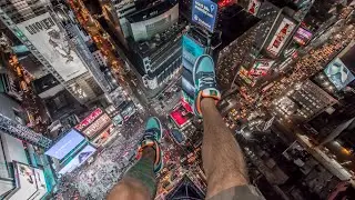 DAREDEVIL PHOTOGRAPHER WANTEDVISUAL DANGLING ABOVE TIMES SQUARE NYC!