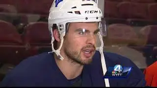 Nigel Robertson tries his hand at ice hockey ahead of the Winter Olympics