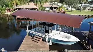 Coastline Boat Lift Cover installed over Contender