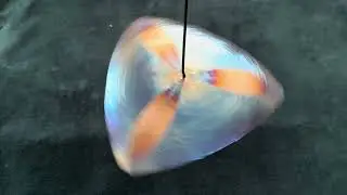 TRI-BELLE 2 . A spinning bell forged from 2mm pure titanium.