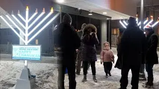 Buffalo Jewish community honors victims of Australia shooting with public menorah lighting