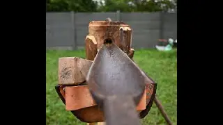 Widening the hole for the blacksmith bellows Tuy&egrave;re, with Giljan De Wilde