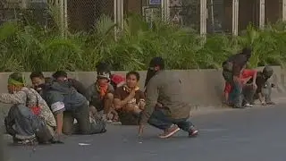 Gunfire and explosions rock Thai capital on eve of election