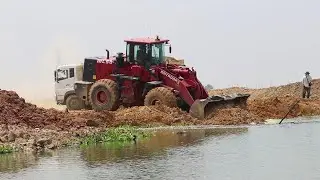 Operator Skills Wheel Loader & Dump Trucks Spreading Land In To Water Land Filling Up