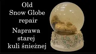 Naprawa starej świątecznej kuli śnieżnej z pozytywką