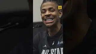 Ja Morant showing off his platinum grillz