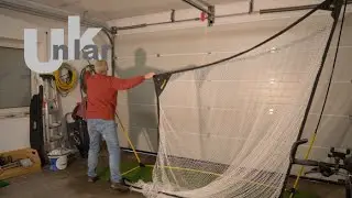 Golftraining mit dem Golfnetz in der Garage