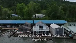 Floating home for sale on the Multnomah Channel