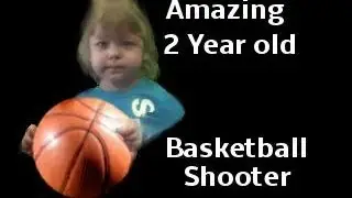Two year old boy toddler with amazing basketball skills shoots hoops
